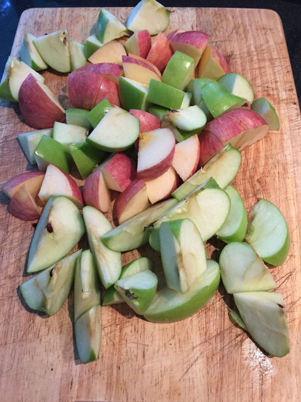 Roughly chopped apples, prepped for making apple cider vinegar